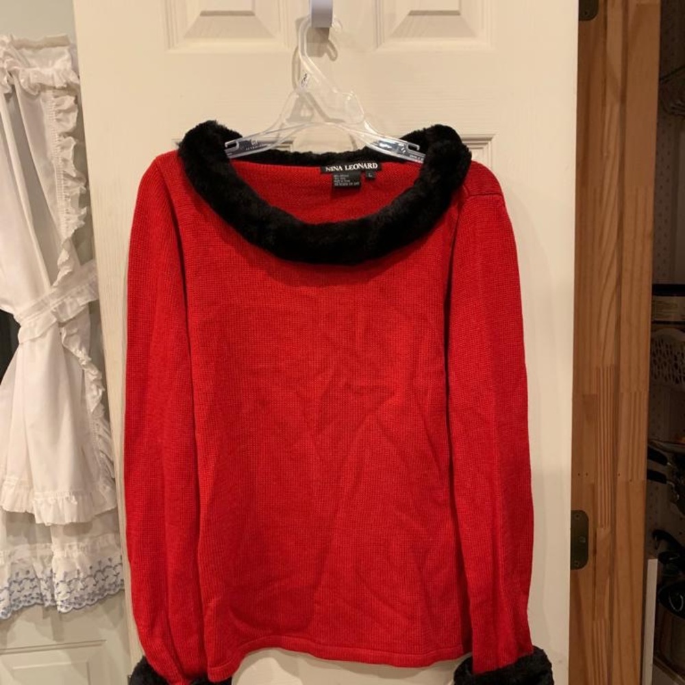 Red sweater with faux fur collar